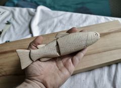 Trout swimmer and the tale of 3000 hand carved scales