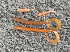 orange silver-fish (jacobs molds) and motoroil/orange laminate basstackle 144